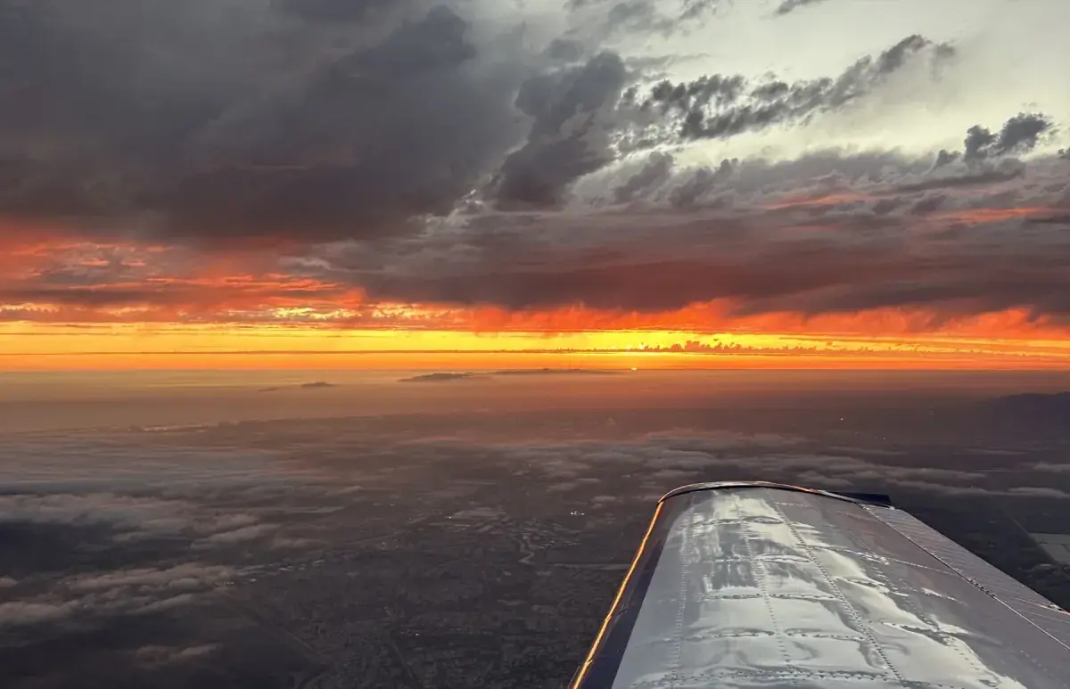 Sunset over the wing on a training flight